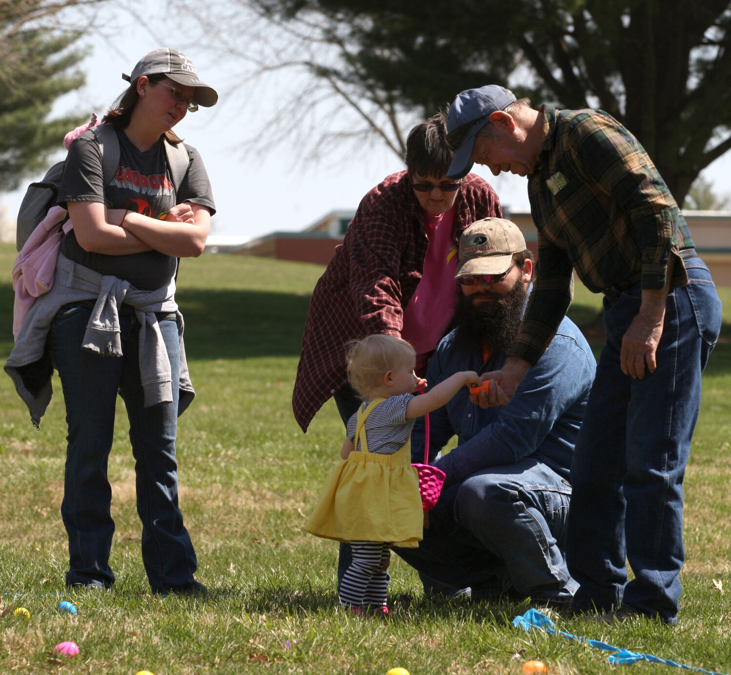 Evelyn Sandefer hands family members eggs